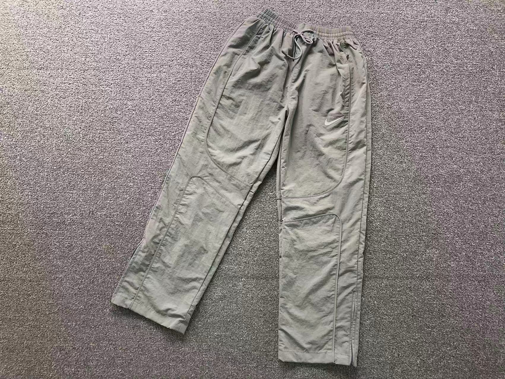 Calça "Onyx Reflective" Nike x Corteiz