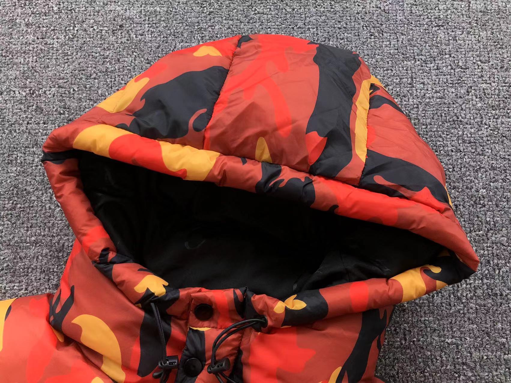Jaqueta Puffer Corteiz Bolo V2 na cor Blood Orange