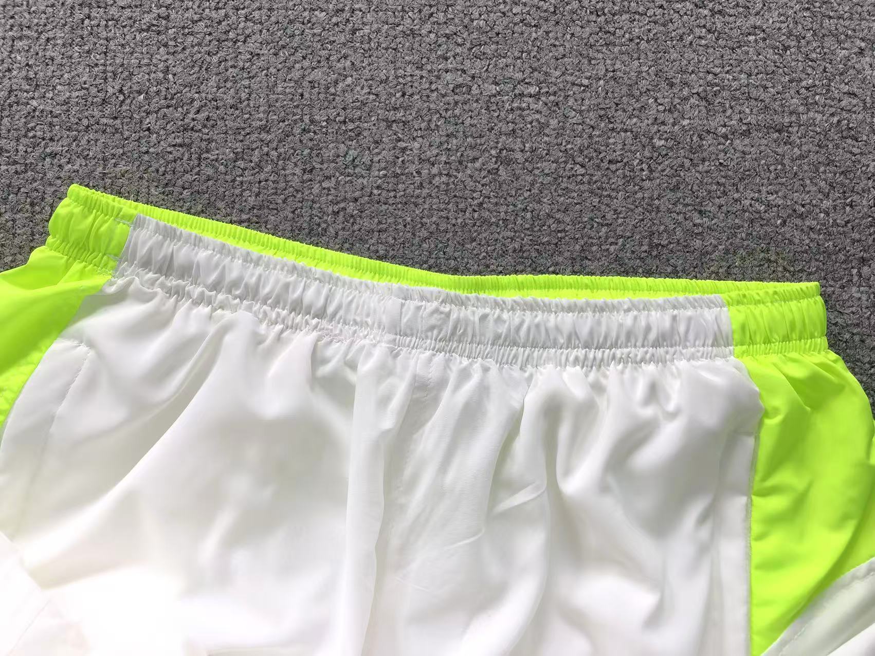 Calça colaboração Palace x Nike Total 90