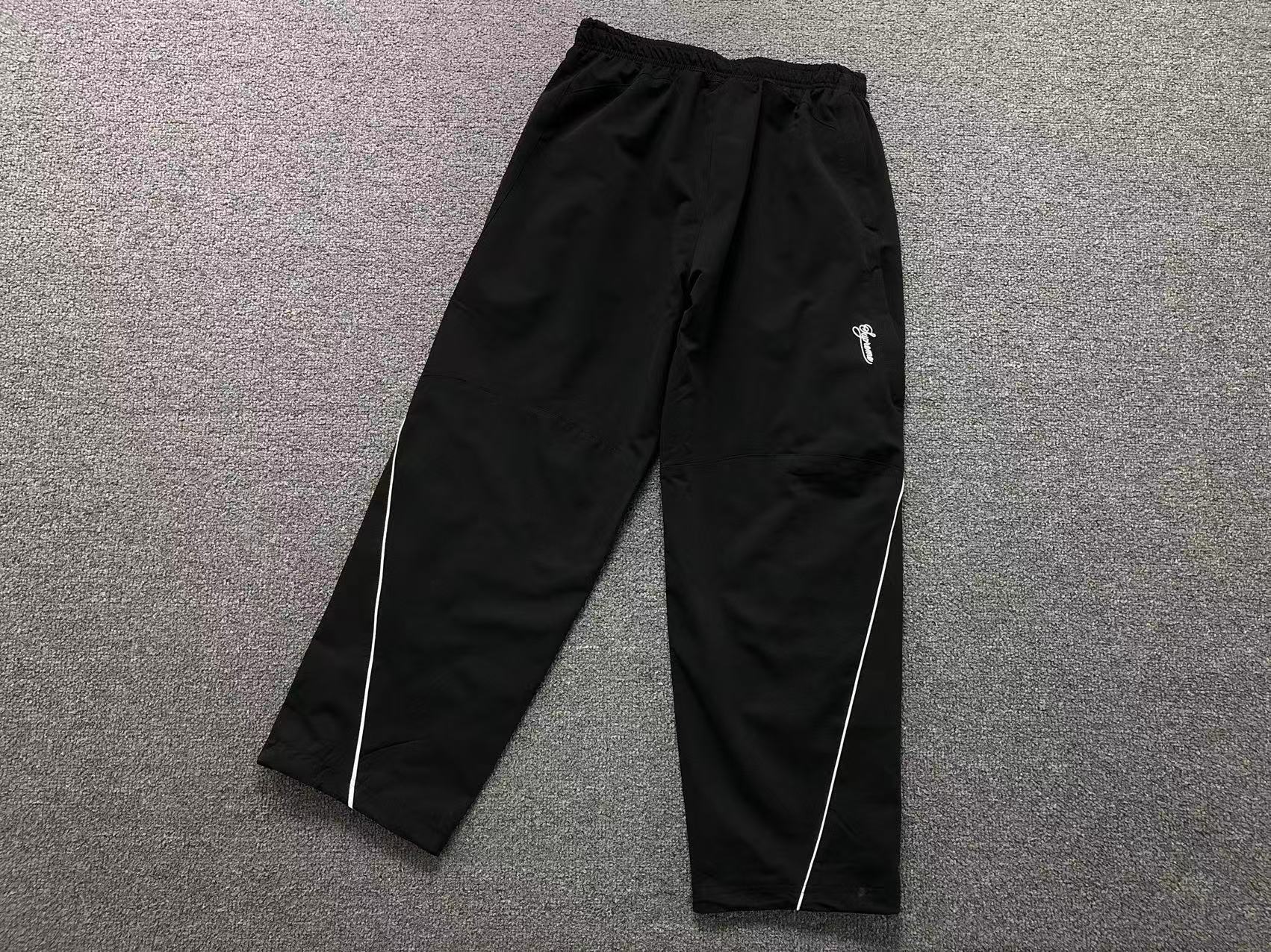 Calça Nike x Supreme Track Suit
