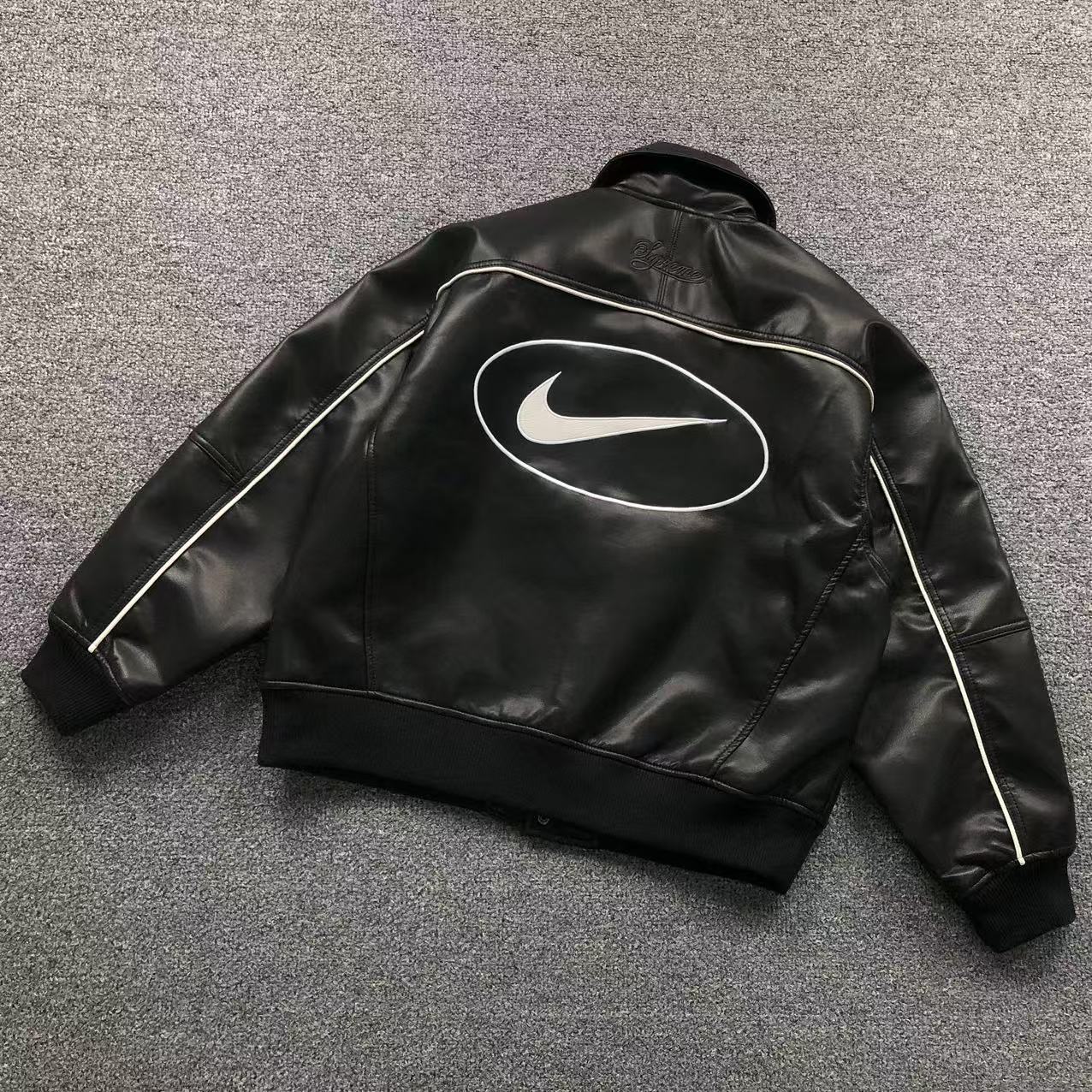 jaqueta varsity de couro Supreme x Nike