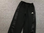 Calças Adidas corte de perna larga (wide-leg)