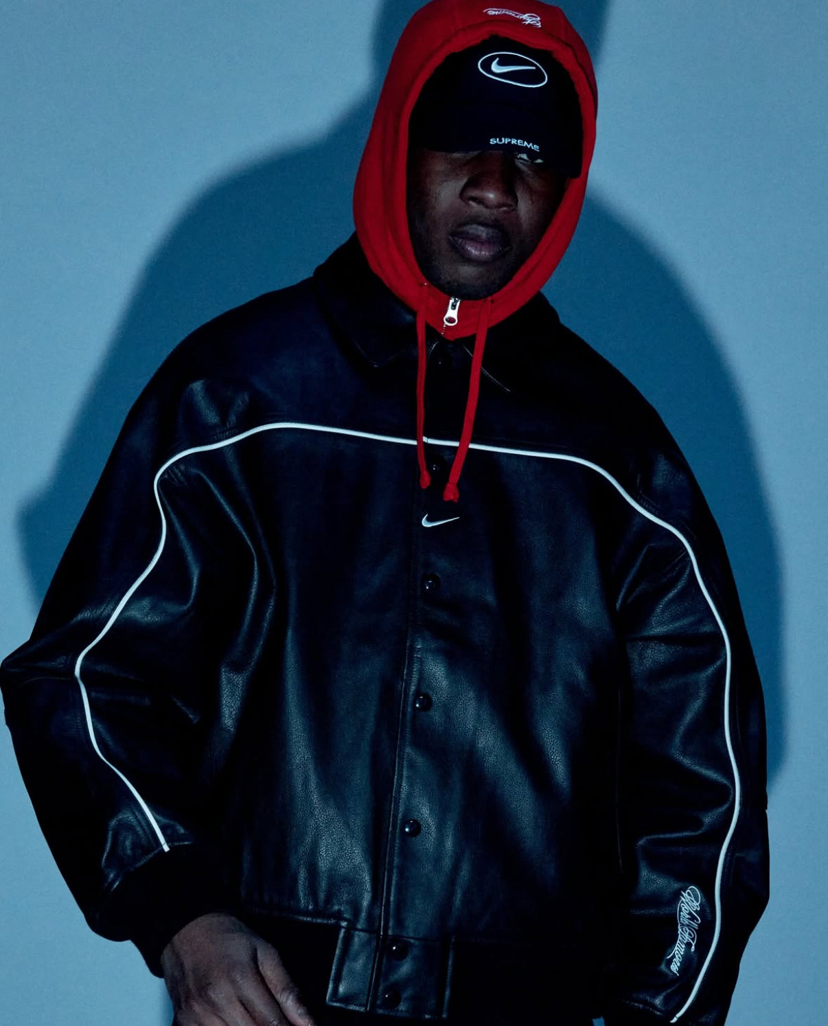 jaqueta varsity de couro Supreme x Nike