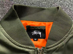 jaqueta bomber Stussy x Comme des Garçons