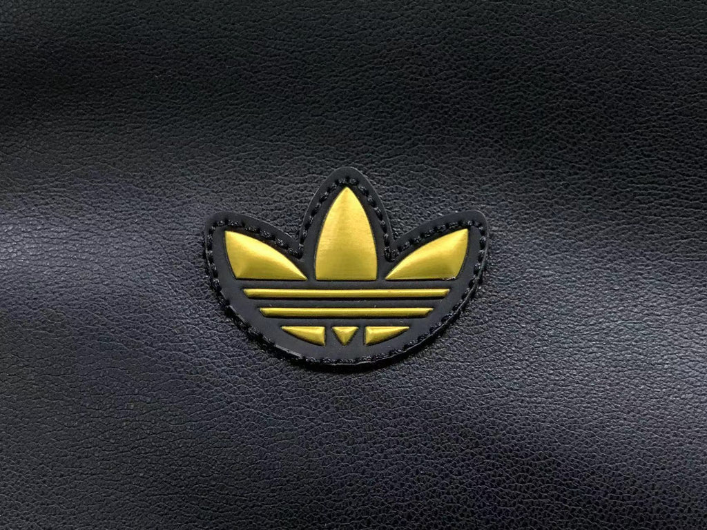 jaqueta Adidas preta de couro sintético