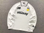 World Tour Polo de manga longa Stussy