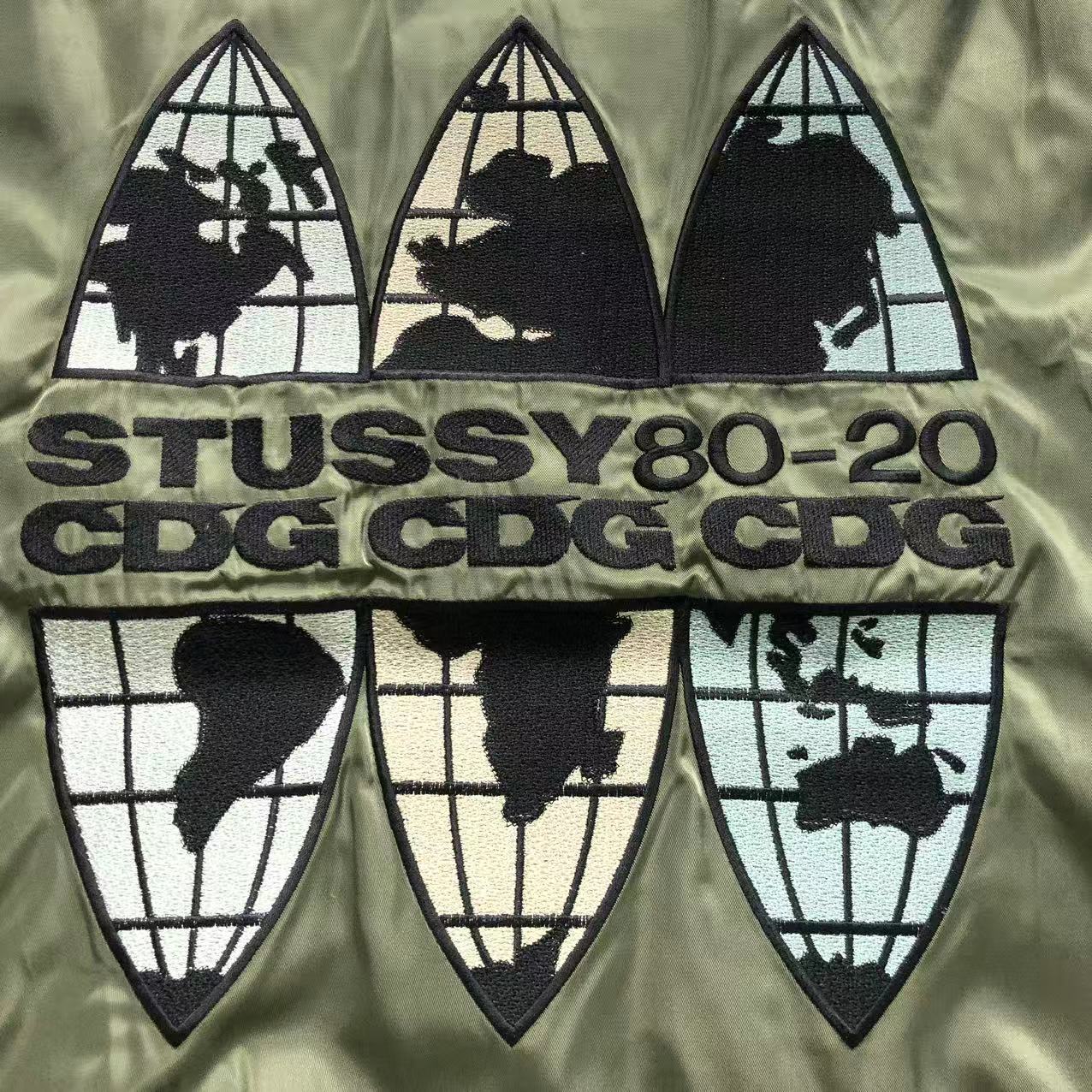 jaqueta bomber Stussy x Comme des Garçons