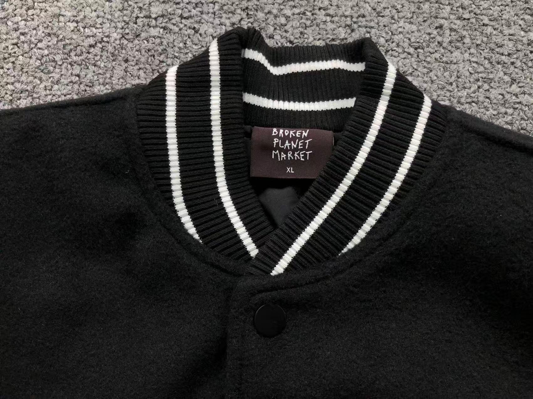 jaqueta Broken Planet Varsity