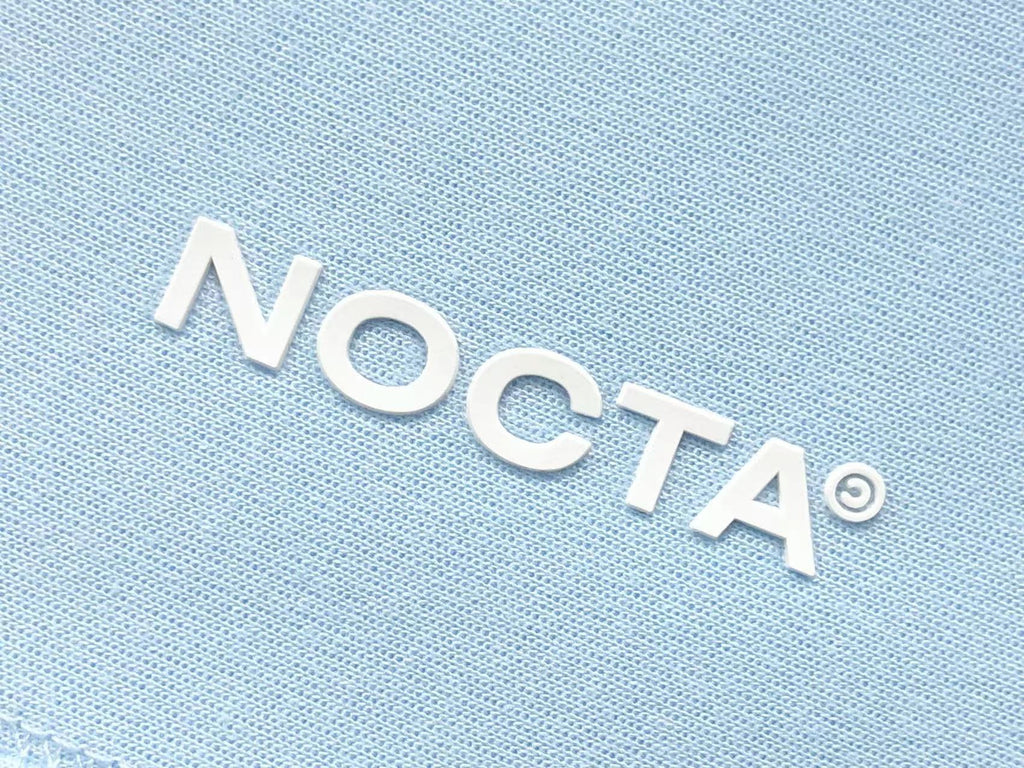 Calça azul claro Nike x NOCTA