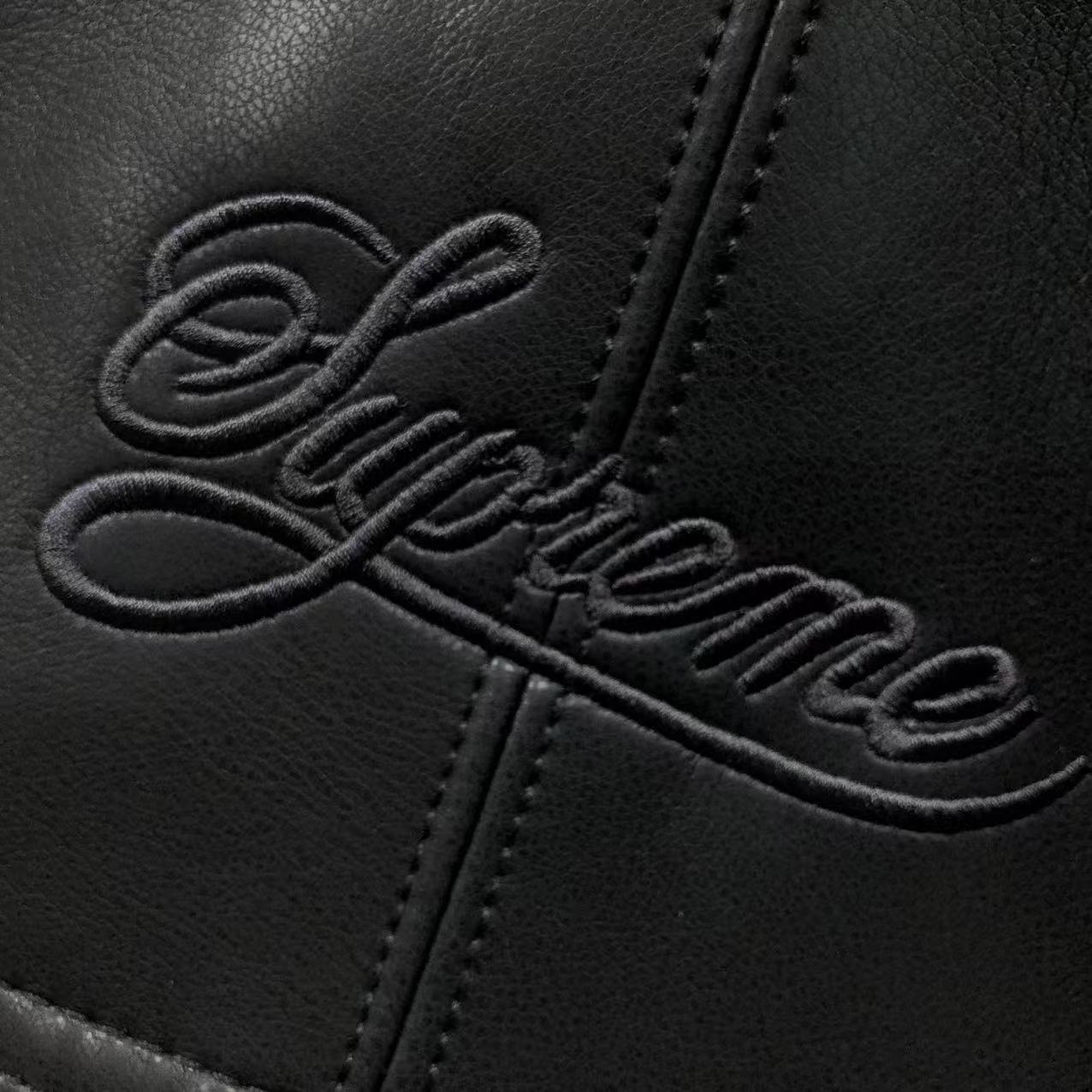 jaqueta varsity de couro Supreme x Nike