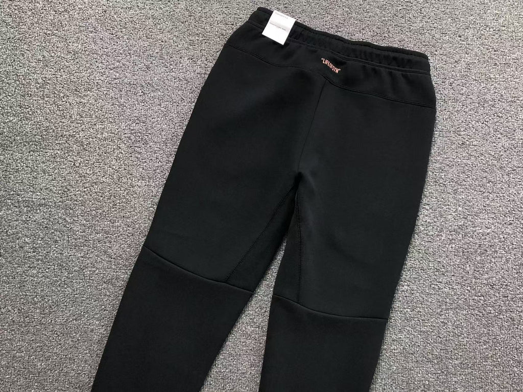 Calça agasalho Nike x Syna World