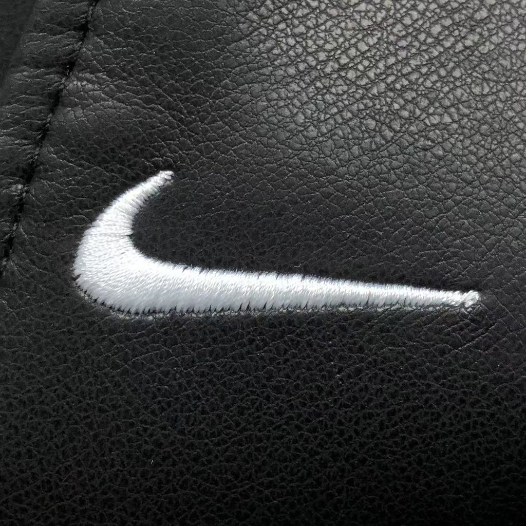 jaqueta varsity de couro Supreme x Nike