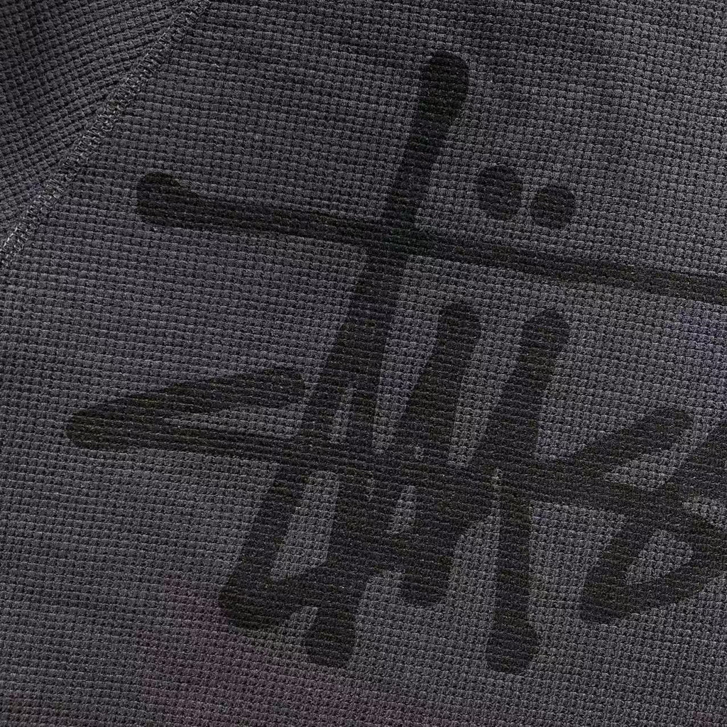 Camiseta térmica raglan camuflada Stussy
