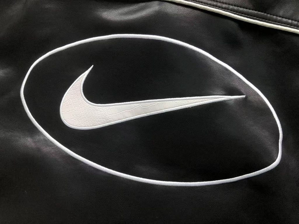 jaqueta varsity de couro Supreme x Nike