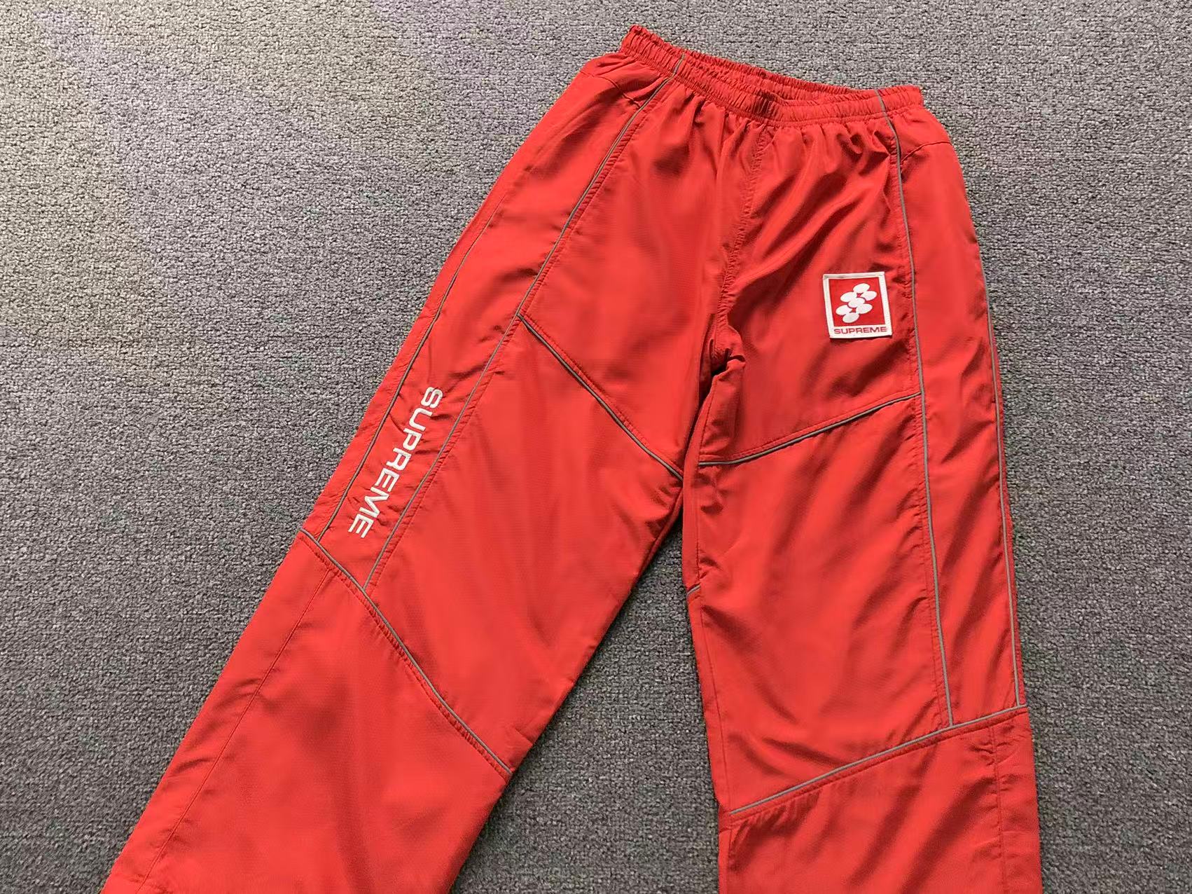 Calça Reflective Piping Pullover Supreme