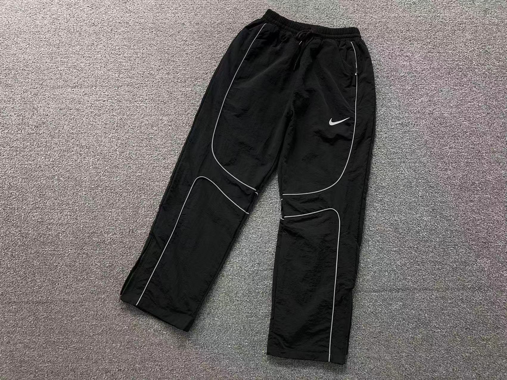 Calça "Onyx Reflective" Nike x Corteiz