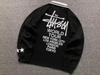 World Tour Polo de manga longa Stussy