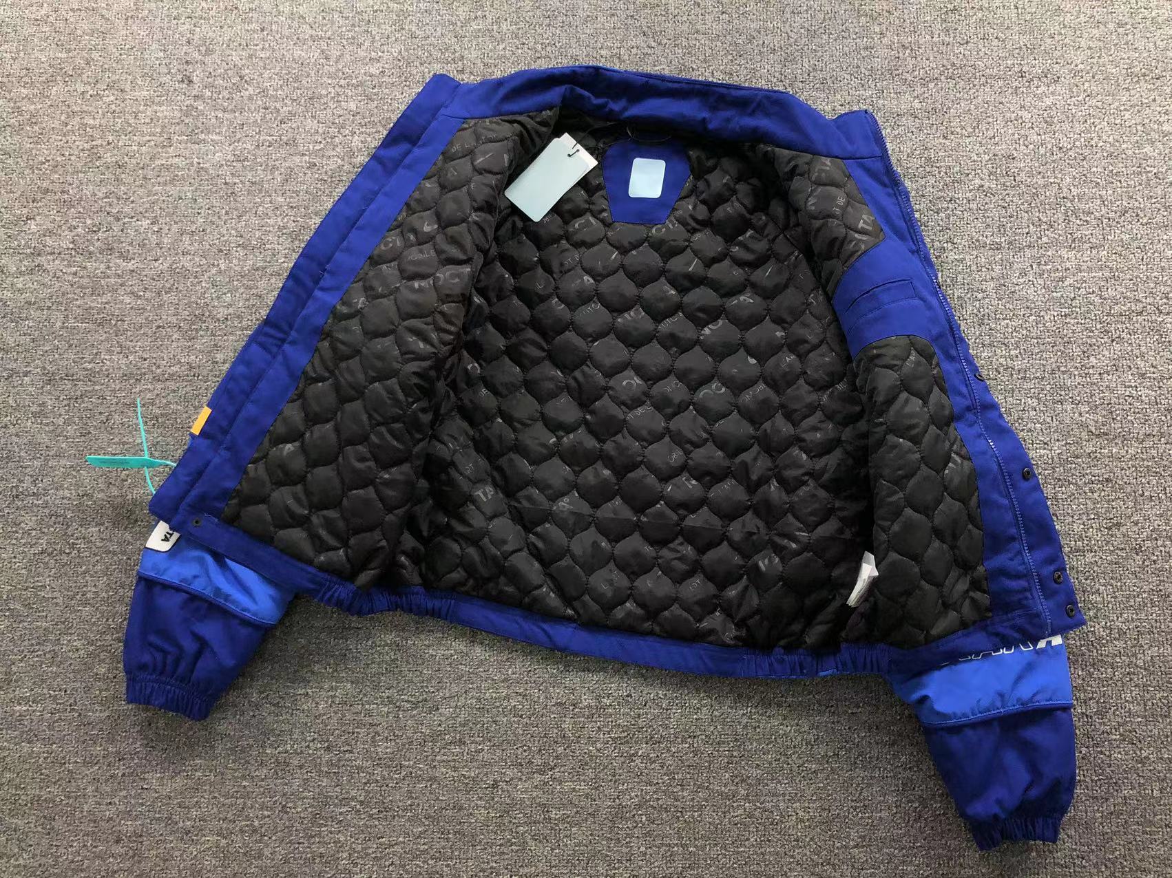 Jaqueta de corrida Nike x NOCTA L'Art