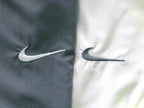 Blusa colaboração Palace x Nike Total 90